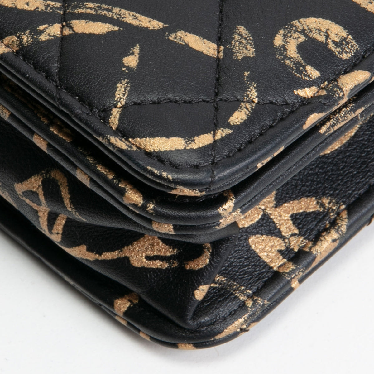 CHANEL Calfskin Quilted Paris-New York Graffiti Pyramid Wallet on Chain- Black